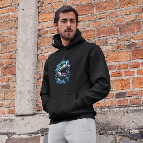 Bearded man against a brick wall wearing black zombie shark graphic hoodie