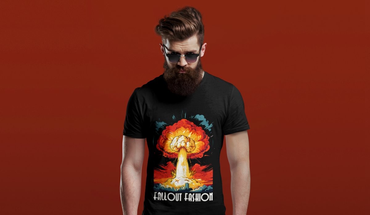 Bearded man in sunglasses wearing black Fallout Fashion T-shirt on a red backdrop